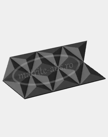 Matrita pentru placi decorative model Prisme-V2 prezentata din unghi oblic, evidentiind relieful geometric al placii obtinute.