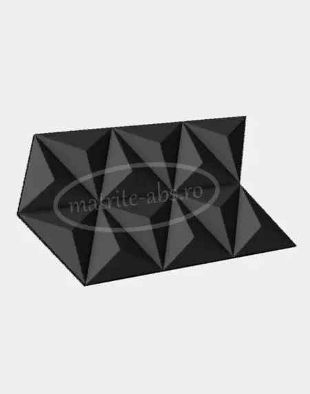 Matrita pentru placi decorative model Prisme-V2, prezentata din unghi oblic lateral, subliniind geometria ascutita si forma tridimensionala a placii obtinute